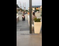 Man falls riding luggage down the ramp
