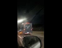 Red light hangs and swings outside truck