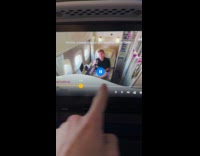 Submitter shows ad hack on plane screen