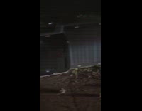 Car flipped side of road parked