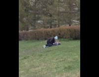 Little kid lie down grass photo shoot