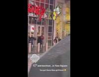 Dancer poses in middle of the street