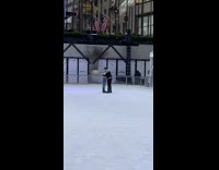 Guy proposes to girlfriend on ice rink 
