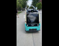 Robot ice cream van rolling on street