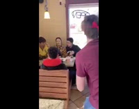 Butterslap challenge, guy red shirt throws packet of butter at girls face forehead