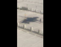 Guy yellow shirt dance water reflection rooftop