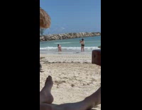 Girl bikini hold head kneel beach jetty