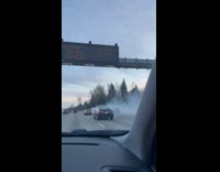 White van on highway emit thick smoke