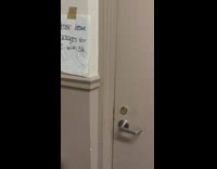 Signs for delivery person direct him to different units 