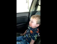 Mom lets little boy sit in front for car wash 
