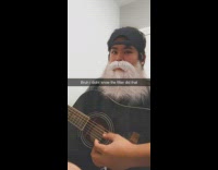 Guy playing guitar with beard mustache filter and it shakes