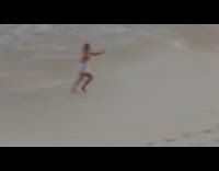 Woman white beach outfit run selfie video
