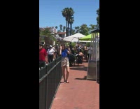 Girl blue jacket take selfie BLM protest
