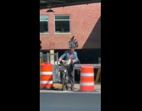 Collab WINY - Guy wears black dragon helmet for biking