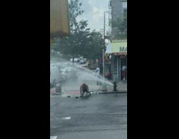 Man does workout on ground next to hydrant 