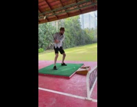 Guy misses golf ball when swinging 