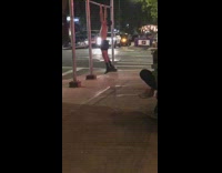 Girl feeds dog guy does pull ups