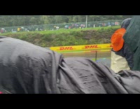 Man plays with the picture of an F1 Racecar