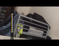 Pink dress little girl jumps off bed 