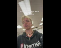 Girl puts dog on desk and in hallway school