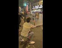 Girl makes heart with hands moulin rouge 