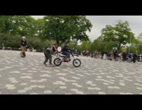 Skateboarder and Electric Unicyclist Follows Motorcycle 