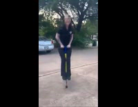 Woman asking for help getting off pogo stick