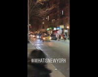 group of men throwing snow balls across street