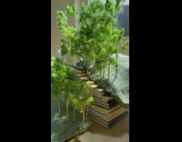 Artist build miniature scenes using desktop items