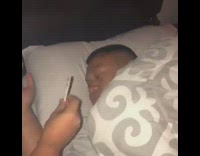 Guy wakes up from sleep to smoke and take a shot of vodka 