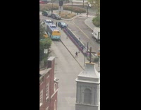 Guy dances with legs apart 