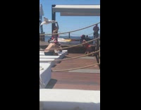 girl red bathing suit friend towel