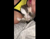 Grey White Bunny Cuddles with Girl Pet Owner