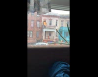 Shirtless man throws wooden dresser from balcony