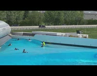 2 guys try to surf at wave pool 