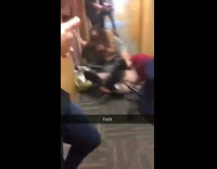 two girls on desk checks slam into each other