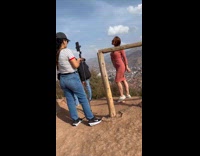 Collab IITW - Woman red dress poses near the cliff