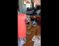 Baby watching iphone show excited scared after drink spills