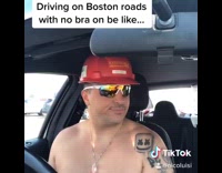 Driving boston roads with no bra guy