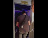 Guy reacts to arcade garage