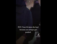 Boyfriend hold hand take lead on crowded street