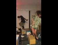 Group of friends dancing in apartment to Wii sports music