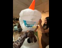 Woman dressed as Olaf for birthday party