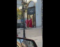 Woman red dress skate shoes Breguet store