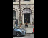 Woman cap tank top sit outside door