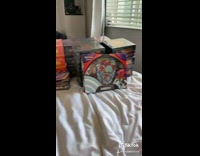 Guy shows girlfriend Pokemon collection