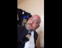 Dog bite  beard hair of bald man