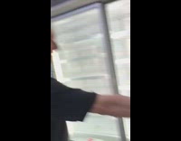 Black red jacket guy lays facedown fridge 