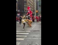 Drag queen bumps into gingerbread guy 