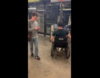 Guy pranked by man on wheelchair at turnstiles 